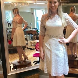 Adorable white laced dress. Wedding or bridal!